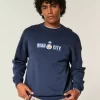 Boxy Manchester City FC Graphic Crew -huppari Boxy Manchester City FC Graphic Crew -huppari