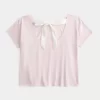 Easy Ribbon Tie-Back kukkagrafiikka T-paita Easy Ribbon Tie-Back kukkagrafiikka T-paita