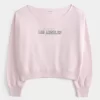 Helppo off-the-shoulder Los Angeles -grafiikkapusero Helppo off-the-shoulder Los Angeles -grafiikkapusero