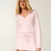 Hupullinen pitkähihainen fleecemekko Hupullinen pitkähihainen fleecemekko