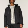 Hupullinen Shell-takki