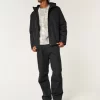 Hupullinen Shell-takki