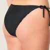 Käännettävä sivusolmio, röyhkeä bikinipohja Käännettävä sivusolmio, röyhkeä bikinipohja
