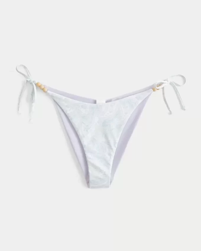 Käännettävä sivusolmio, röyhkeä bikinipohja Käännettävä sivusolmio, röyhkeä bikinipohja