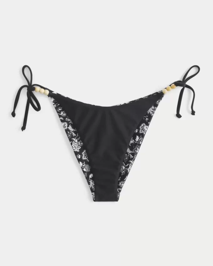 Käännettävä sivusolmio, röyhkeä bikinipohja Käännettävä sivusolmio, röyhkeä bikinipohja