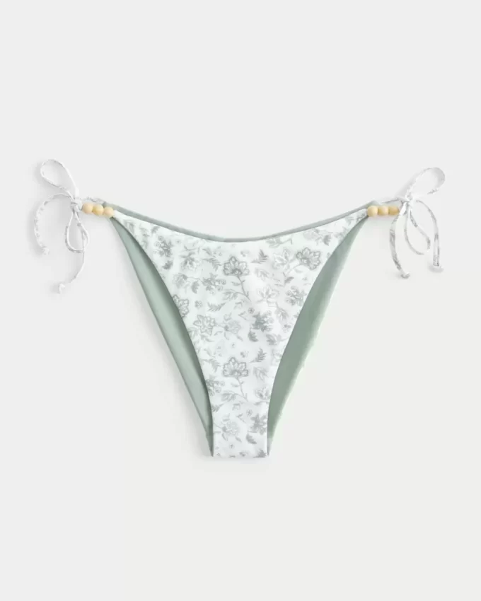 Käännettävä sivusolmio, röyhkeä bikinipohja Käännettävä sivusolmio, röyhkeä bikinipohja