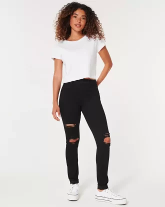 Korkeat revityt mustat Jean-leggingsit