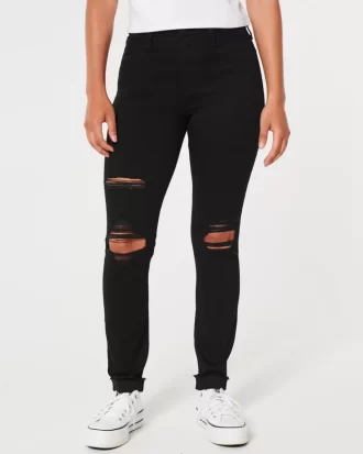 Korkeat revityt mustat Jean-leggingsit