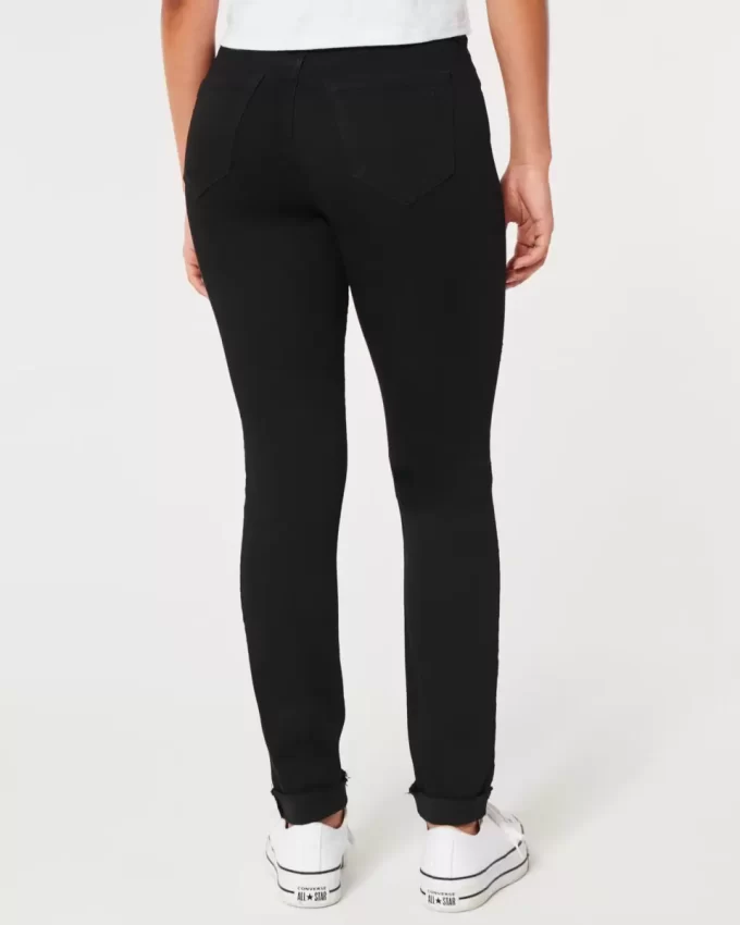 Korkeat revityt mustat Jean-leggingsit Korkeat revityt mustat Jean-leggingsit