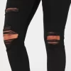 Korkeat revityt mustat Jean-leggingsit Korkeat revityt mustat Jean-leggingsit