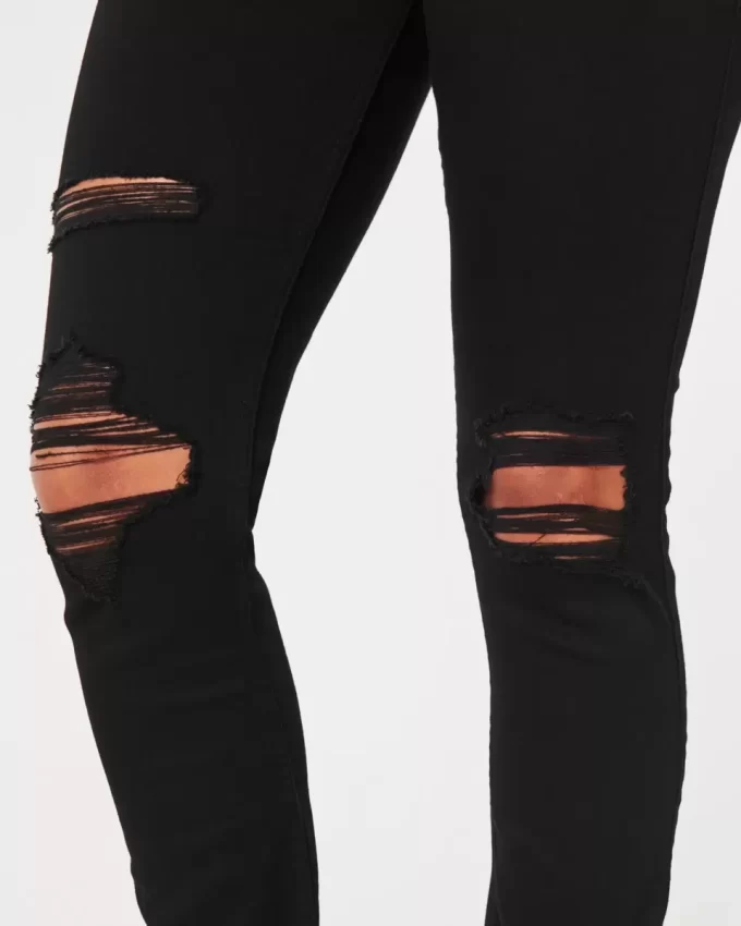 Korkeat revityt mustat Jean-leggingsit Korkeat revityt mustat Jean-leggingsit
