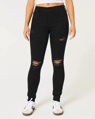 Korkeat, revityt mustat Super Skinny -farkut