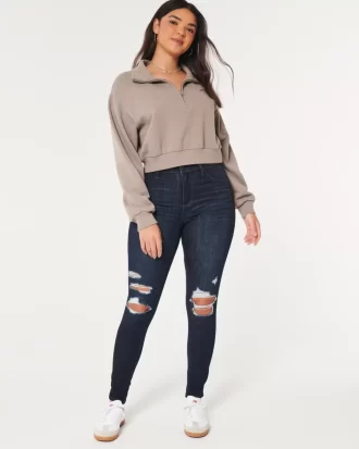 Kurvikkaat korkean kohoavat revityt tumma pesu Jean leggingsit