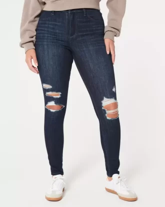 Kurvikkaat korkean kohoavat revityt tumma pesu Jean leggingsit