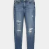 Kurvikkaat korkean nousun repeytyneet keskipesut Super Skinny -farkut Kurvikkaat korkean nousun repeytyneet keskipesut Super Skinny -farkut