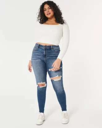 Kurvikkaat korkean nousun repeytyneet tummapesu Super Skinny -farkut