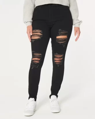 Kurvikkaat korkeat, revityt mustat Super Skinny -farkut