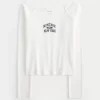 Lace Trim Off-the-Shoulder Montauk Graphic T-paita Lace Trim Off-the-Shoulder Montauk Graphic T-paita