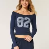 Lace Trim Off-the-Shoulder Number Graphic T-paita Lace Trim Off-the-Shoulder Number Graphic T-paita