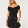 Mid-Rise laskostettu Mini Skort Mid-Rise laskostettu Mini Skort