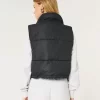 Mini vetoketjullinen pufferliivi