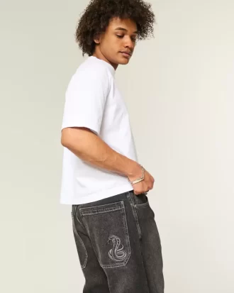 Pestyt mustat brodeeratut Snake Skater Baggy -farkut