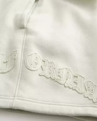 Polven yläpuolelle ulottuvat Calif Graphic Baggy -fleece-shortsit