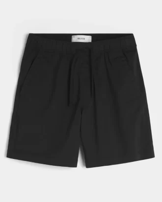 Polven yläpuolelle ulottuvat Twill-shortsit