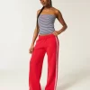 Raidalliset leveälahkeiset lenkkihousut
