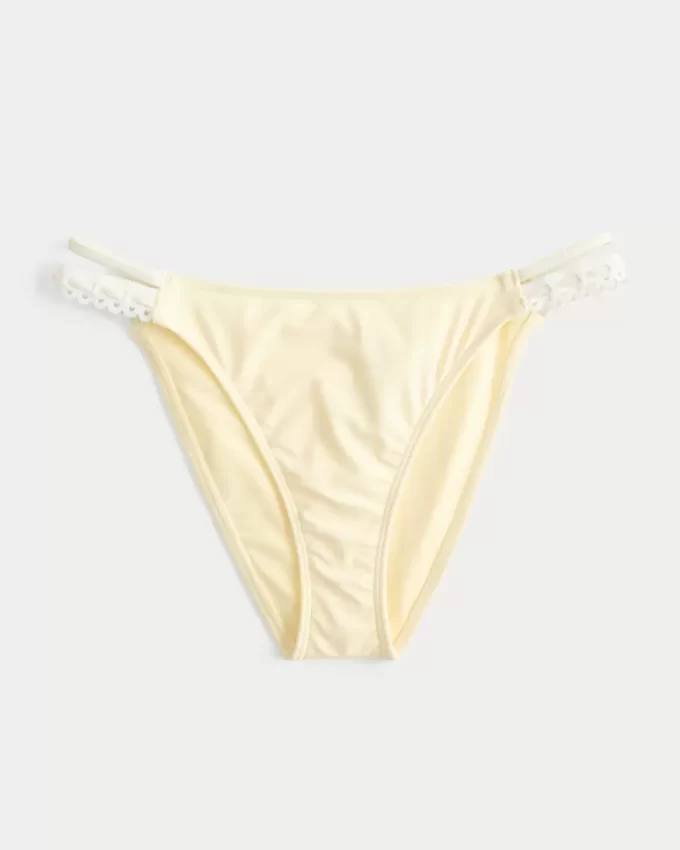 Virkatutyylinen verhoilu, kaksinkertainen hihna, röyhkeä bikinipohja Virkatutyylinen verhoilu, kaksinkertainen hihna, röyhkeä bikinipohja