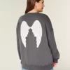 Ylisuuri Angel Wings Graphic Crew -huppari Ylisuuri Angel Wings Graphic Crew -huppari