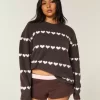 Ylisuuri Heart Pattern Crew -villapaita Ylisuuri Heart Pattern Crew -villapaita