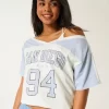 Ylisuuri off-the-shoulder Varsity San Diego Graphic T-paita